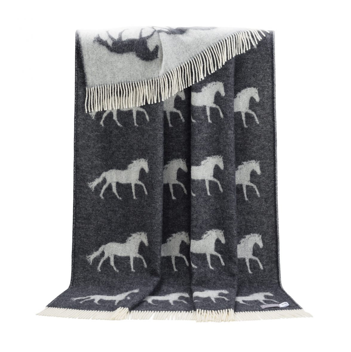 Gray blanket with white horse pattern on a white background