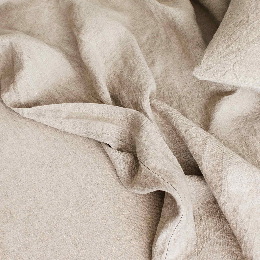 Close-up of beige fabric with folds