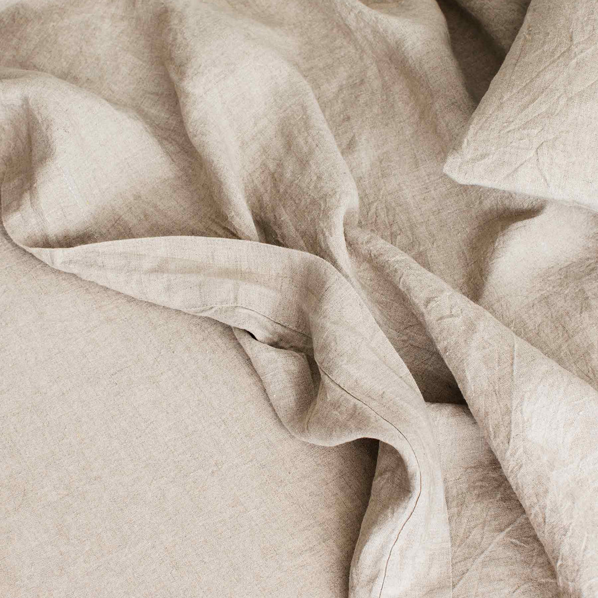 Close-up of beige fabric with folds