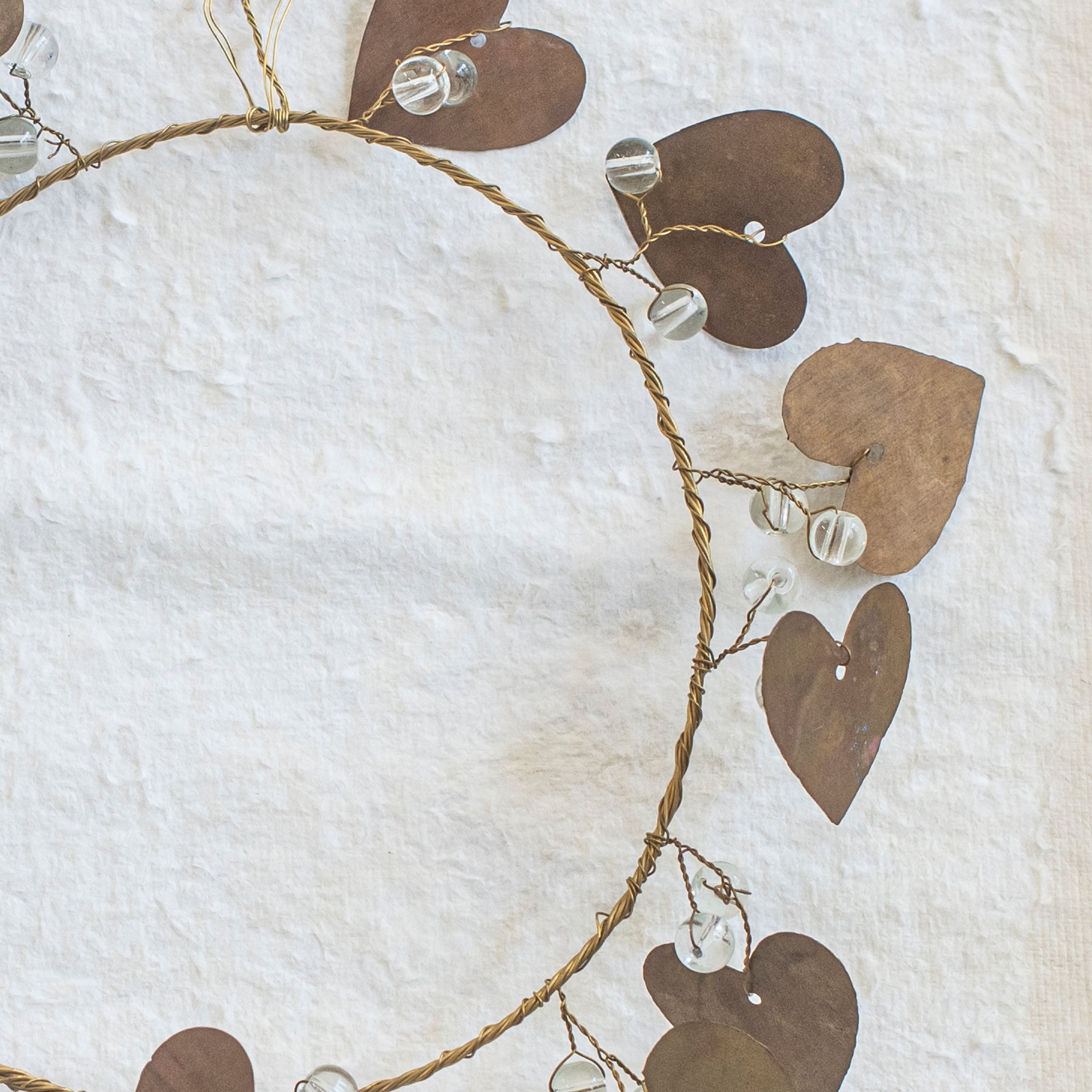 Brass Wreath with Heart and Bead Detail