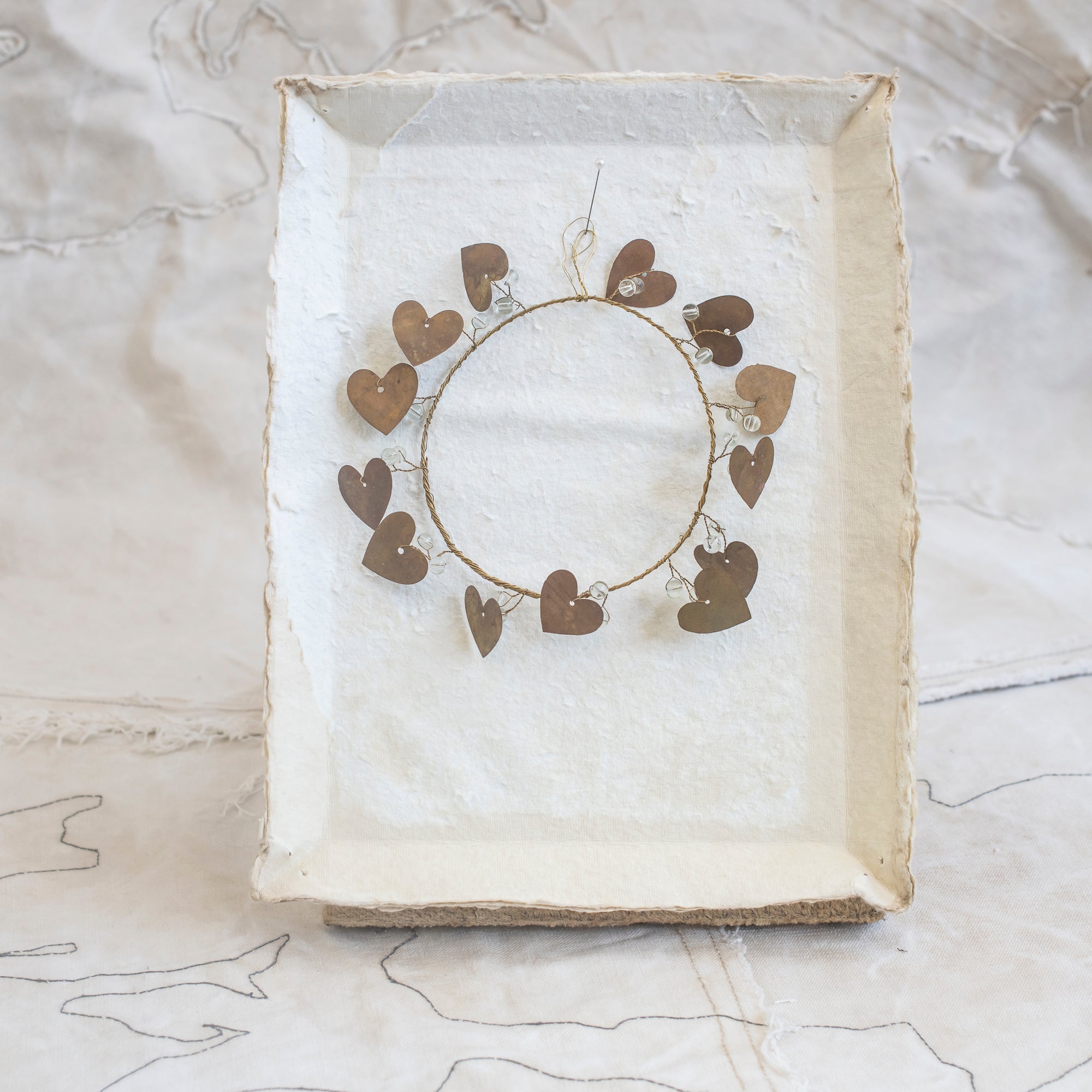 Brass Wreath with Heart and Bead Detail
