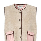 Beige fleece vest with pink accents on a white background