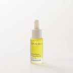 Bottle of San Marco body oil on a white background