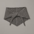 Black and white patterned fabric on a gray background