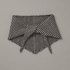 Black and white patterned fabric on a gray background